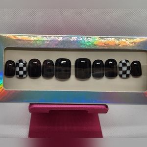 Short square black with black and white check accent nail. Press On Nails